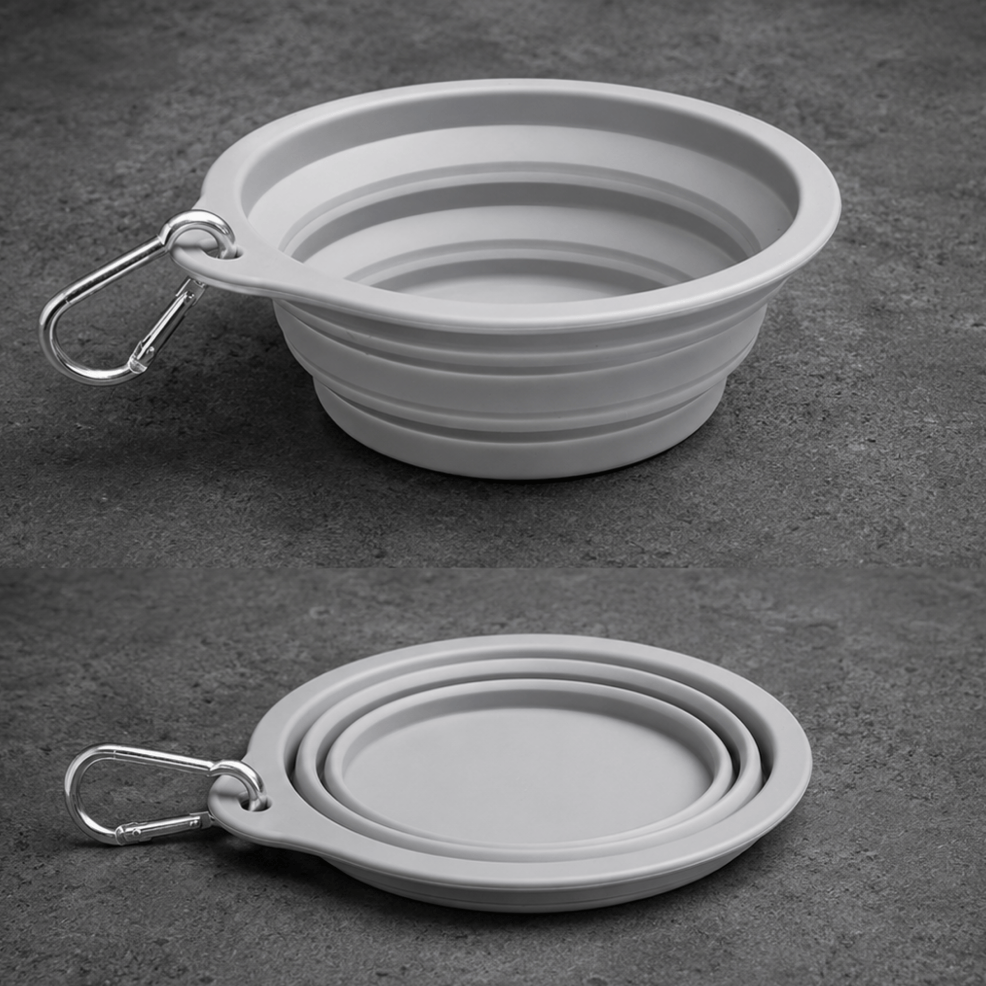 Collapsible gray dog bowl with carabiner on a dark surface
